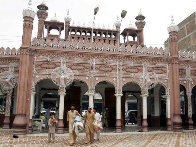 the bomber was shot dead by mosque guard amin hussain as he tried to enter an imambargah in bhara kahu shortly after friday prayers on the first day of eid photo ppi the bomber was shot dead by mosque guard amin hussain as he tried to enter an imambargah in bhara kahu shortly after friday prayers on the first day of eid photo ppi