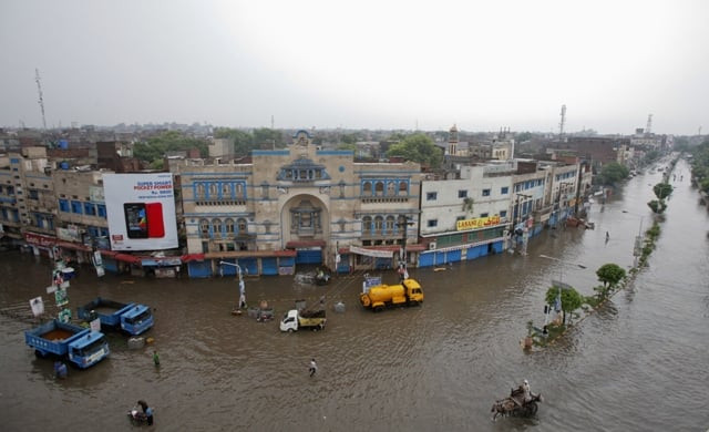a general view of a flooded street after a heavy downpour in lahore august 14 2013 photo reuters a general view of a flooded street after a heavy downpour in lahore august 14 2013 photo reuters