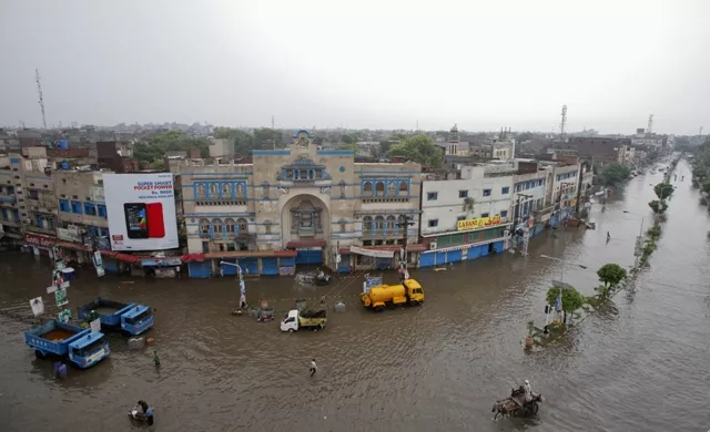 a general view of a flooded street after a heavy downpour in lahore august 14 2013 photo reuters a general view of a flooded street after a heavy downpour in lahore august 14 2013 photo reuters