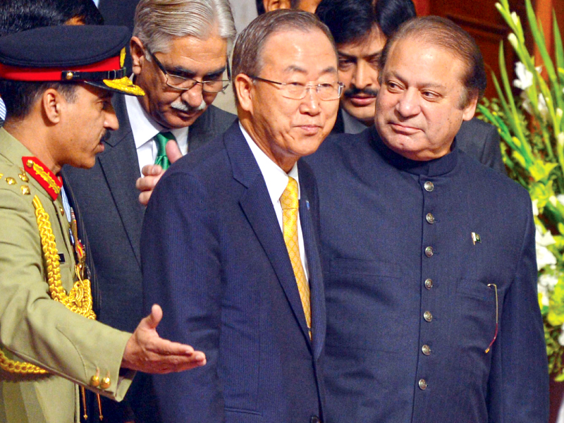premier nawaz arrives with un chief ban ki moon for a ceremony to mark independence day photo afp