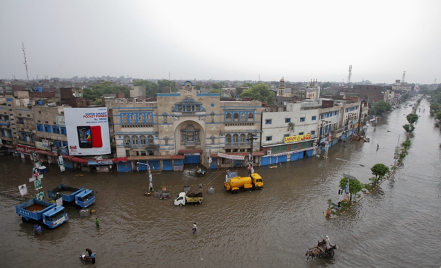 a general view of a flooded street after a heavy downpour in lahore on august 14 2013 photo reuters file