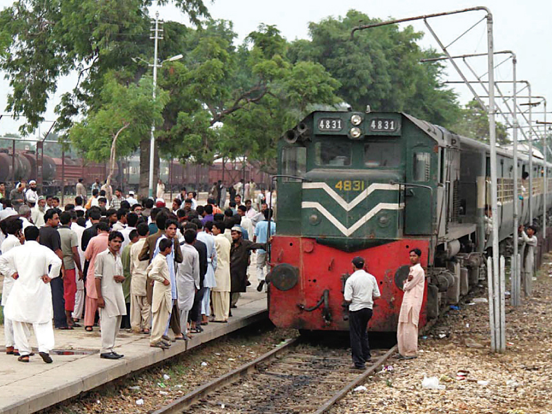 people gather around the zakria express after a firing incident which left a child dead photo online