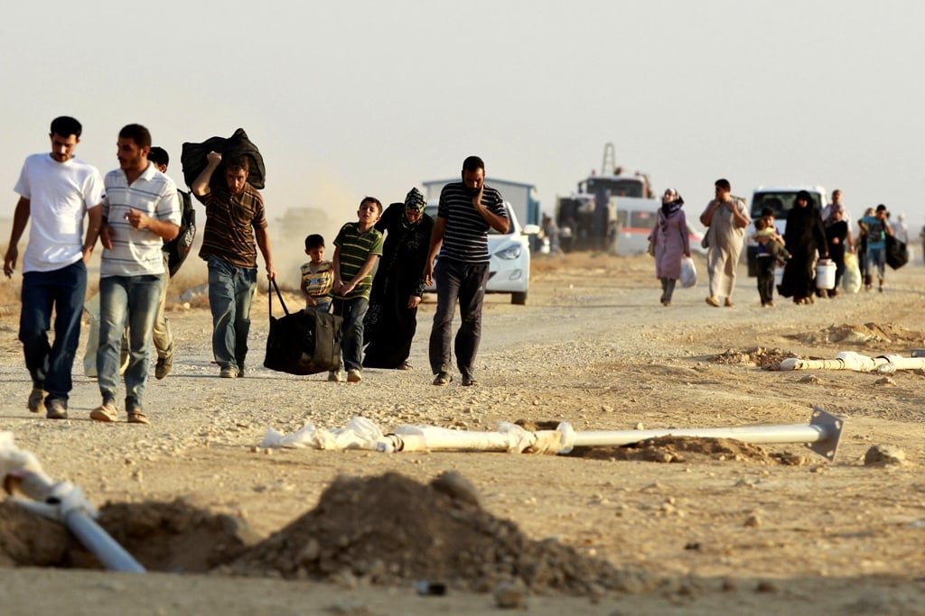 unhcr spokesperson says 750 people initially came into iraqi kurdistan followed by a huge crowd of 5 000 to 7 000 photo reuters file