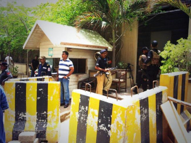 scene outside gate of express news office after the incident scene outside gate of express news office after the incident