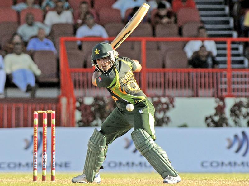 umar suffered a back strain while playing in the caribbean premier league cpl where he was performing dual duties as wicket keeper and batsman photo afp