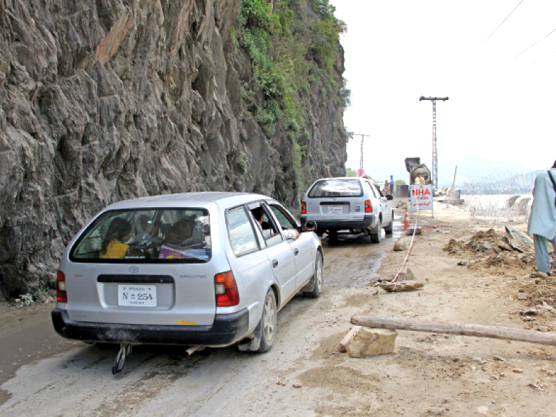 the main mingora kalam road at fizagat was damaged by the recent floods and causes a lot of traffic congestion photo fazal khaliq express