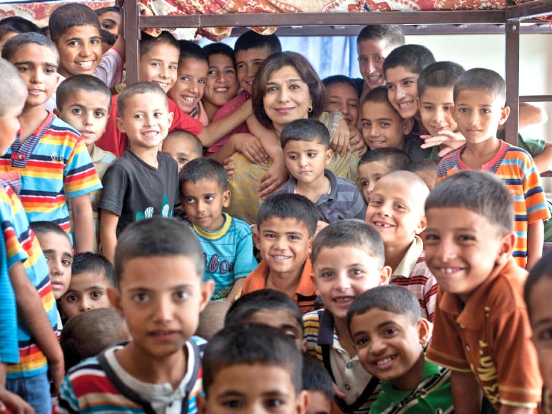 boys pose for a photograph with sonia shahid photo myra iqbal express