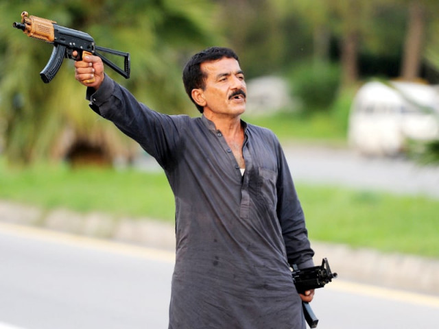 sikandar who kept traffic and business activities on the point in blue area suspended for many hours photo afp file sikandar who kept traffic and business activities on the point in blue area suspended for many hours photo afp file