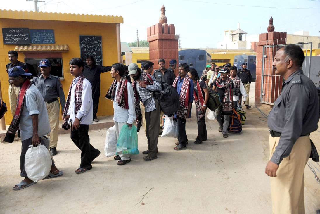 freed indian fishermen exit a pakistani jail before boarding a bus in karachi on april 14 2011 photo afp file