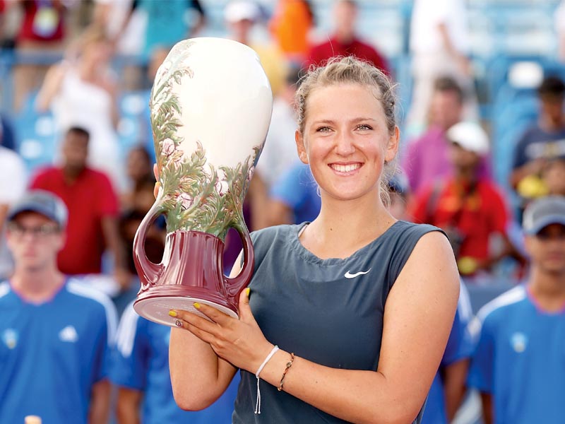 azarenka acknowledged that her two and a half hour battle against serena in the final was tough but was elated to have come out of it as the winner photo afp