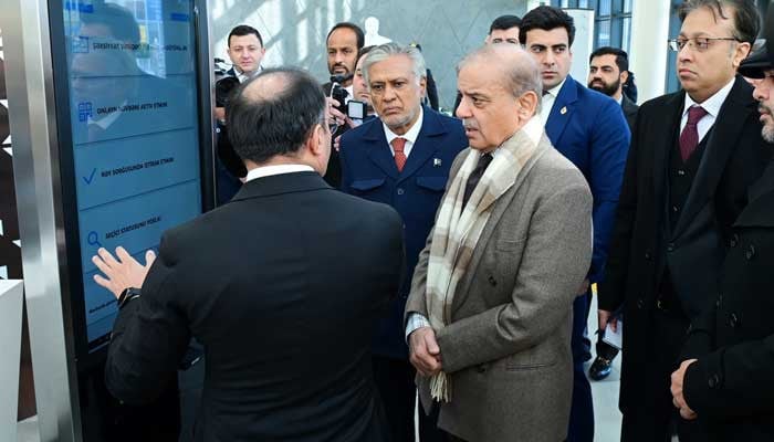 prime minister shehbaz sharif was briefed by ulvi mehdiyev chairman of the state agency for public service and social innovation about the services offered by asan khidmat during his visit to one of the centers in baku azerbaijan on february 25 2025 courtesy press information department