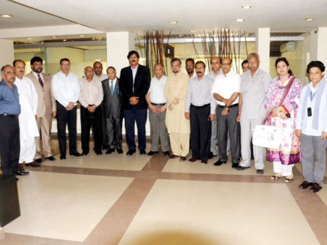 in solidarity a delegation of all pakistan newspapers association visited the express media office on tuesday to express solidarity after the attack on the office on friday apns president sarmad ali condemned the attack photo express
