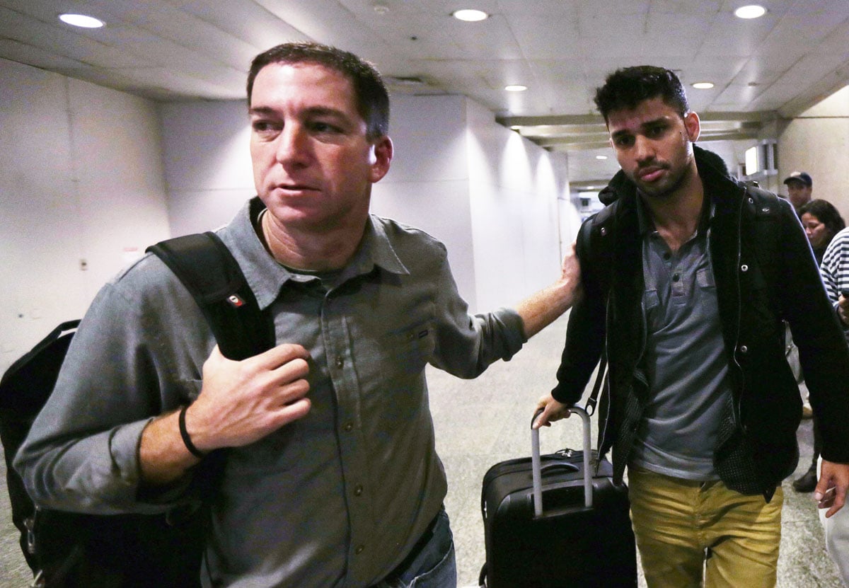 us journalist glenn greenwald l walks with his partner david miranda r in rio de janeiro 039 s international airport in this august 19 2013 file photo photo reuters