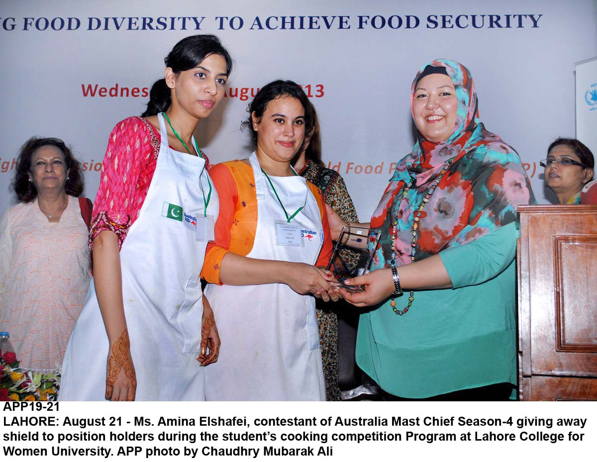 elshafei giving away shield to winners during the cooking competition program at lahore college for women university photo app