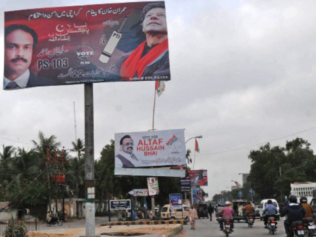 billboards of pakistan tehreek e insaf and muttahida qaumi movement have been displayed in north nazimabad for the by elections starting today photo express billboards of pakistan tehreek e insaf and muttahida qaumi movement have been displayed in north nazimabad for the by elections starting today photo express