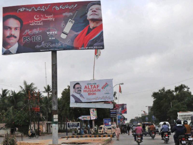 billboards of pakistan tehreek e insaf and muttahida qaumi movement have been displayed in north nazimabad for the by elections starting today photo express