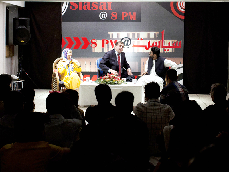 the play opens on the sets of a fictional political talk show called siasat 8pm photo myra iqbal
