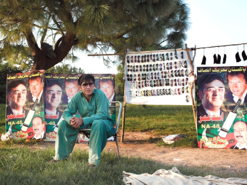 turnout might have been low but this salesman and his fellow pti supporters won the day photo myra iqbal express