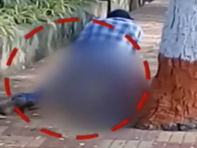 a woman is seen being raped on a busy walkway in broad daylight in the city of vishakhapatnam india photo screenshot