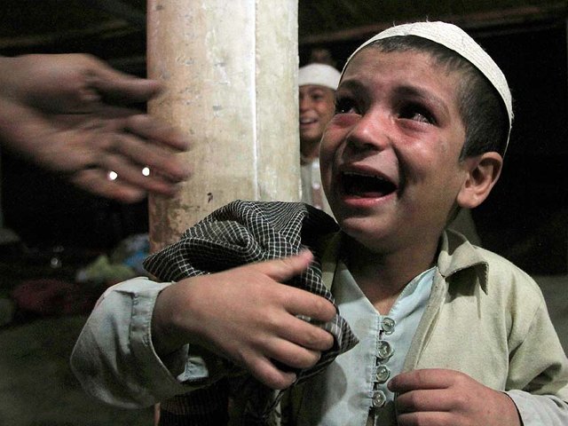 a pakistani child weeps after being rescued by police photo ap