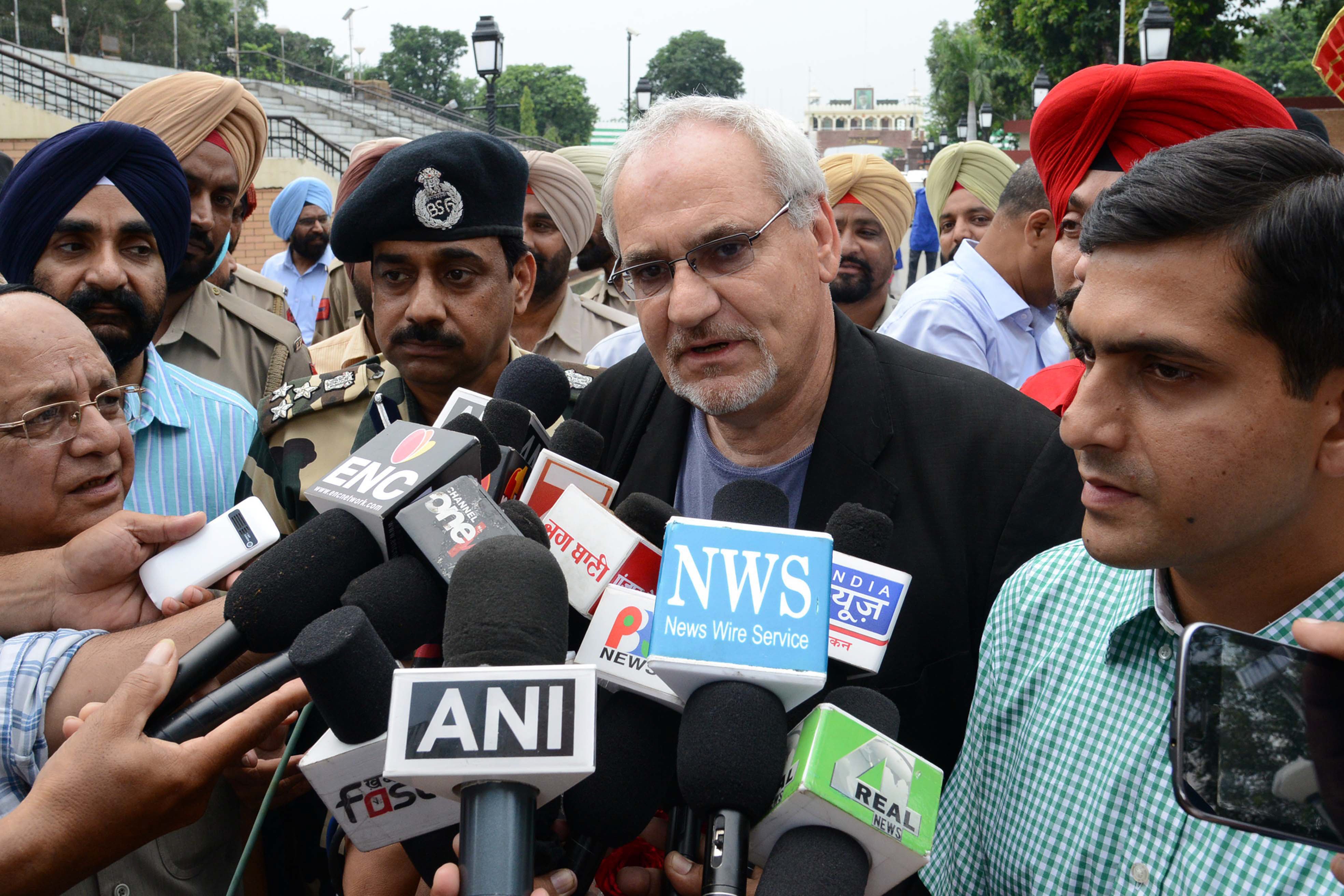 philippe le houerou c vice president for the world banks south asia region speaks to the media after he arrived at the india pakistan wagah border post on august 24 2013 photo afp