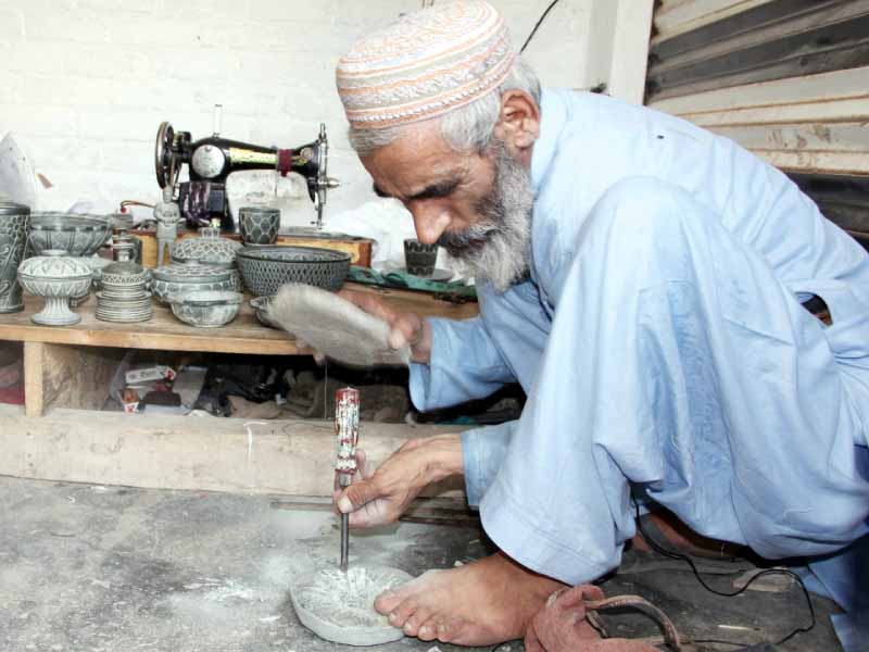 ramzan s carvings are inspired by gandhara artifacts photo fazal khaliq express