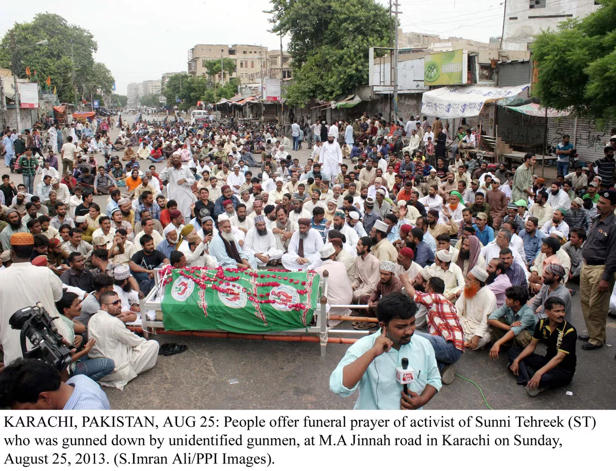 people protesting after the funeral of pakistan sunni tehreek pst sector in charge javed alias kaka who was found dead on saturday photo ppi people protesting after the funeral of pakistan sunni tehreek pst sector in charge javed alias kaka who was found dead on saturday photo ppi
