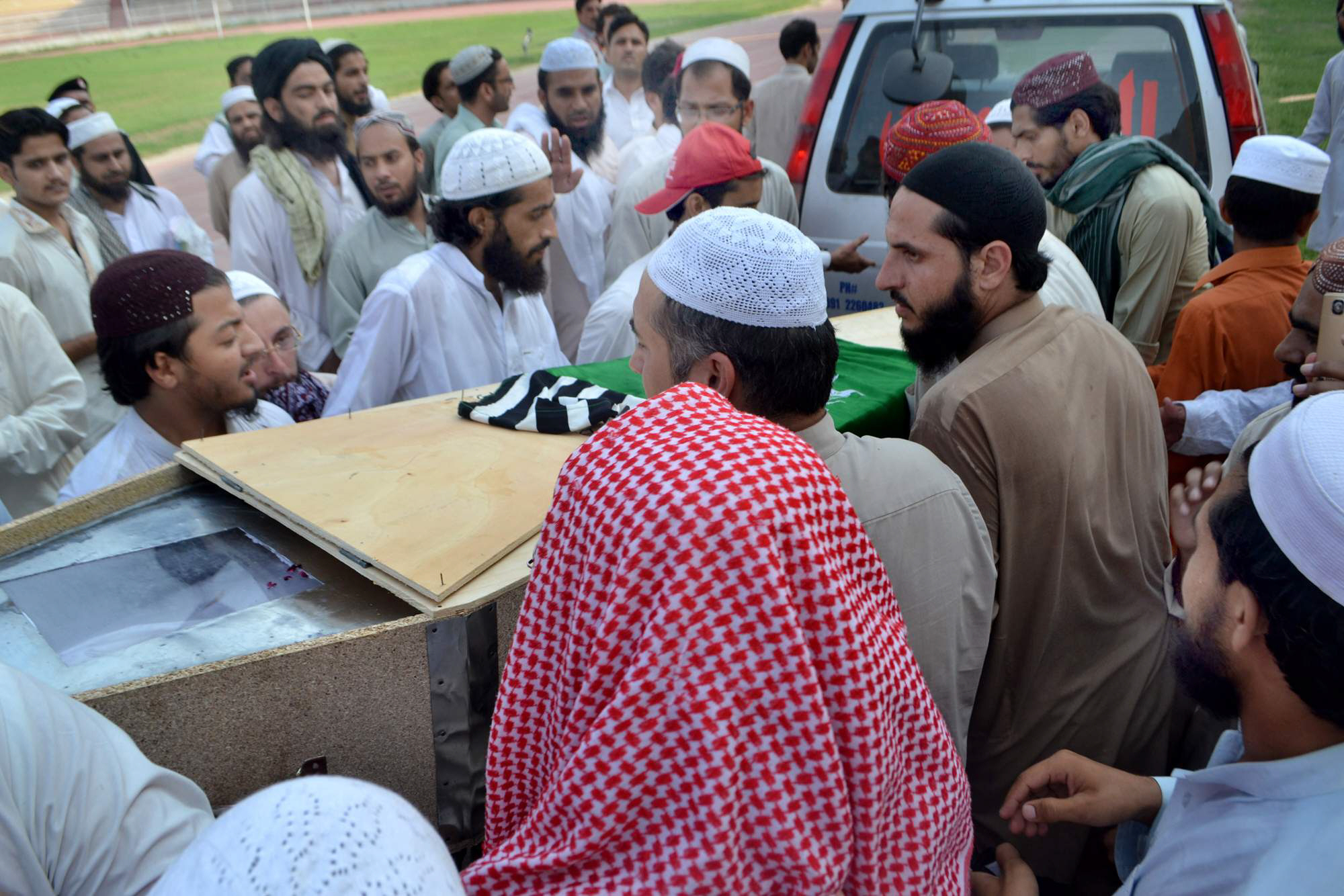 body of aswj 039 s spokesperson maulana saeed farooqui arrives in his home town of mohmand on monday after he was gunned down on sunday photo iqbal haider express