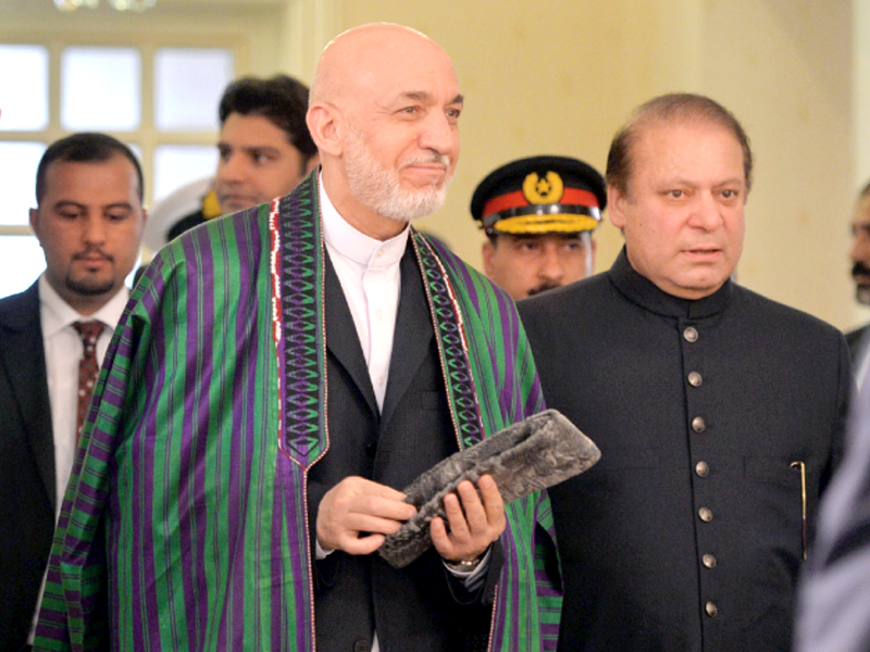 president karzai arrives at the prime minister office for talks photo afp