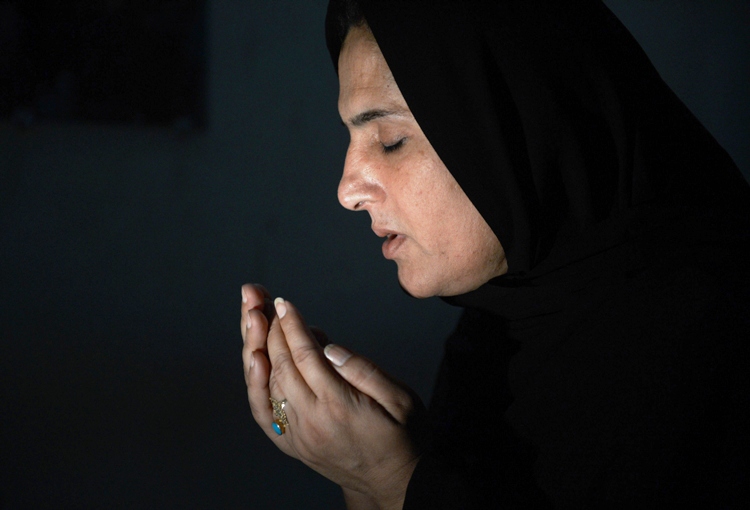 this photograph taken on april 5 2013 shows transgender sanam faqeer an independent candidate for pakistan 039 s forthcoming general elections offering prayers at her residence in the southern city of sukkur photo afp file
