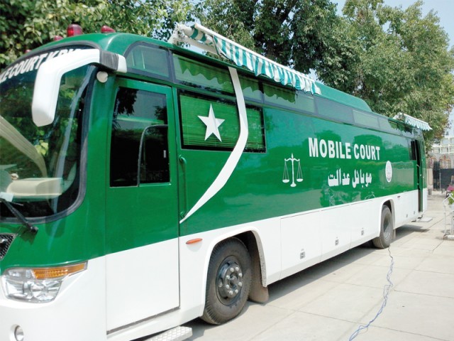 the travelling court is equipped with a solar energy generation system it will travel to villages across khyber pakhtunkhwa to deliver justice to people at their doorstep photo express