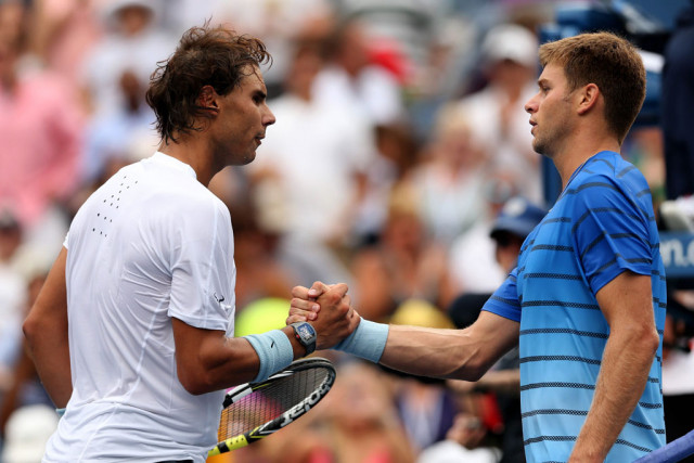 rafael nadal of spain shakes hands with ryan harrison of the united states after their first round men 039 s singles match on day one of the 2013 us open photo afp