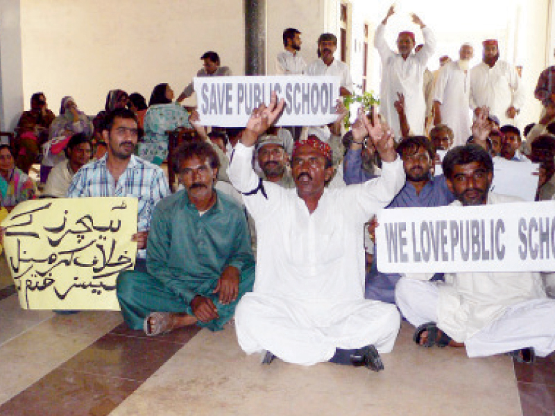 members of the government secondary teachers association protest against the registration of fir against the association s district president in hyderabad on tuesday photo online