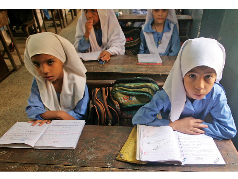 female students in lyari are struggling to get educated without being a burden on their families they believe that is the only way to improve their neighbourhood s condition photo athar khan express