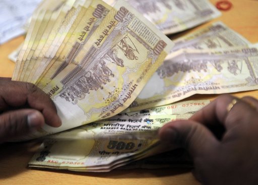 indain rupee slumped upto 16 percent against the us currency this year photo afp