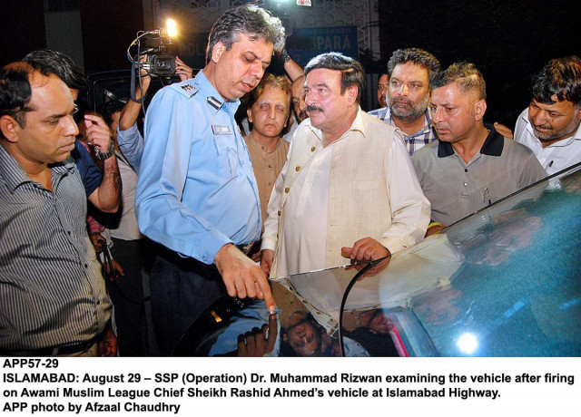 ssp operations dr rizwan examining the car of sheikh rasheed after the firing ncident photo app ssp operations dr rizwan examining the car of sheikh rasheed after the firing ncident photo app