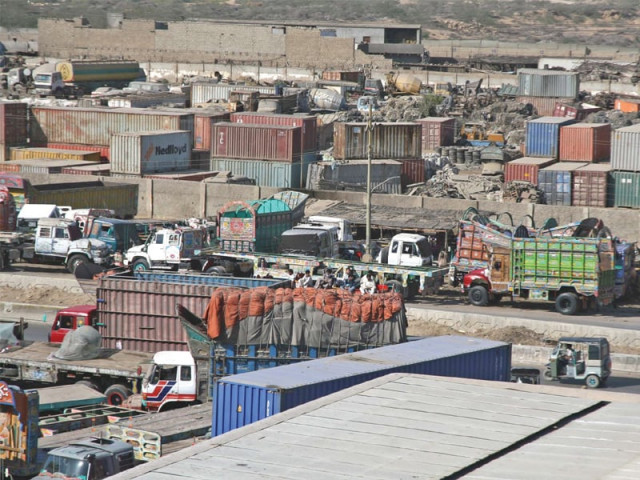 this file photo of the quaid e azam international truck stand at mauripur road shows trucks at a standstill at the stand as good carriers went on a strike to protest against extortion and targeted killings in the city