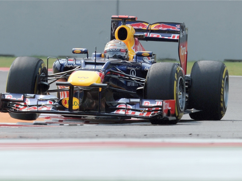 sebastian vettel is gearing up to add a third italian gp to his tally as he takes on the track at monza this weekend photo file afp