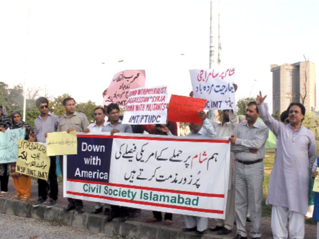 members of civil society protesting against us president s decision to attack syria photo muhammad javaid express members of civil society protesting against us president s decision to attack syria photo muhammad javaid express
