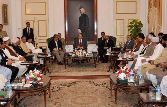 prime minister nawaz sharif being briefed by members of political parties on the security situation of karachi photo pid