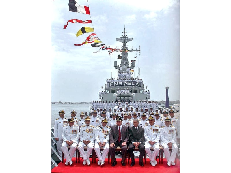 prime minister nawaz sharif chief of naval staff admiral asif sandila pose for a group photo with navy brass and the men and officers of the pns aslat at dockyard on tuesday photo app