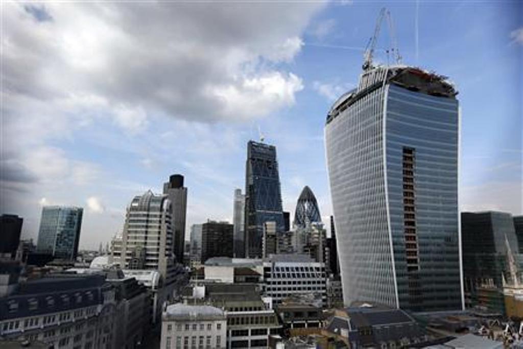 the glass clad tower dubbed the walkie talkie reflects sunlight at an intensity capable of melting parts of a car photo reuters