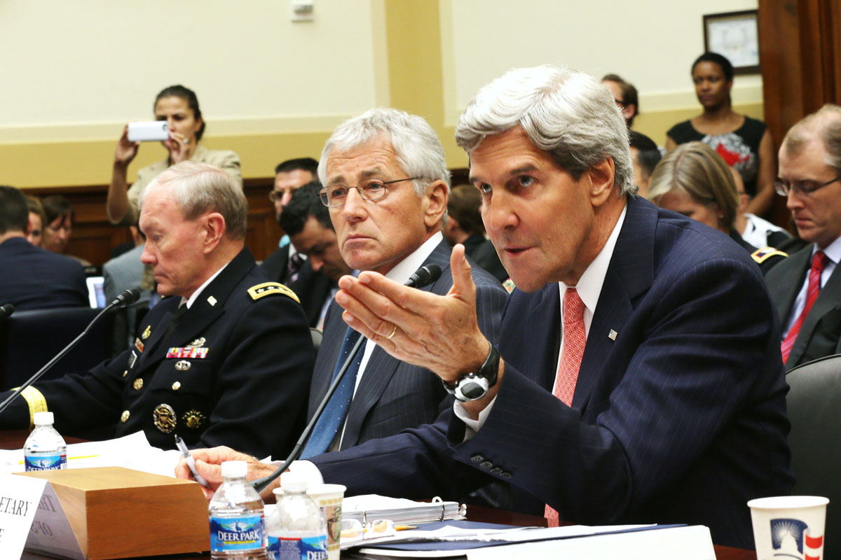 us secretary of state john kerry r with us secretary of defence chuck hagel c and us joint chiefs of staff gen martin dempsey l during a senate house committee hearing photo afp
