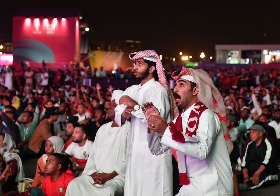 soccer football   fifa world cup qatar 2022   fifa fan festival   al bidda park doha qatar   november 25 2022 qatar fan watches the match between qatar and senegal reuters jennifer lorenzini