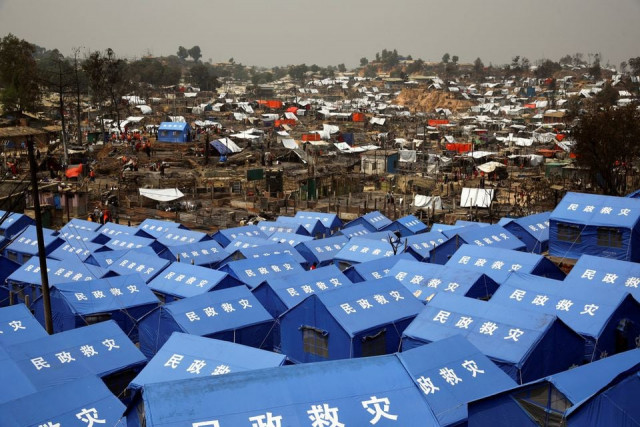 newly built makeshift tents are seen at the rohingya refugee camp where a massive fire destroyed thousands of shelters in cox s bazar bangladesh march 24 2021 reuters newly built makeshift tents are seen at the rohingya refugee camp where a massive fire destroyed thousands of shelters in cox s bazar bangladesh march 24 2021 reuters