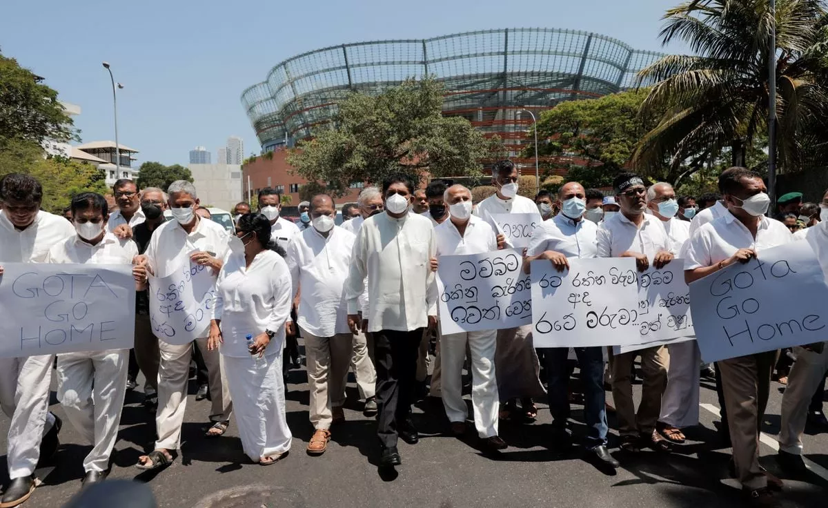 sajith premadasa leader of the opposition alliance samagi jana balawegaya marches along with other opposition lawmakers towards independence square as they shout slogans against president gotabaya rajapaksa after the government imposed a curfew following a clash between police and protestors near sri lankan president gotabaya rajapaksa s residence during a protest last thursday amid the country s economic crisis in colombo sri lanka april 3 2022 photo reuters sajith premadasa leader of the opposition alliance samagi jana balawegaya marches along with other opposition lawmakers towards independence square as they shout slogans against president gotabaya rajapaksa after the government imposed a curfew following a clash between police and protestors near sri lankan president gotabaya rajapaksa s residence during a protest last thursday amid the country s economic crisis in colombo sri lanka april 3 2022 photo reuters
