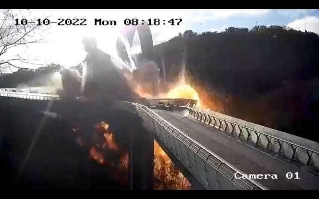 a missile strikes near the glass bridge as russia s invasion of ukraine continues in kyiv ukraine october 10 2022 in this screen grab from a video obtained by reuters a missile strikes near the glass bridge as russia s invasion of ukraine continues in kyiv ukraine october 10 2022 in this screen grab from a video obtained by reuters