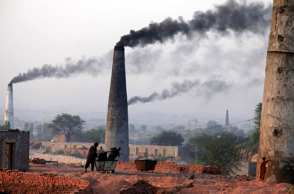 Smoke rises from the smoke stacks of brick factories on the outskirts of Islamabad. PHOTO: REUTERS