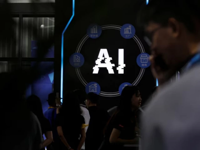 visitors stand near a sign of artificial intelligence at an ai robot booth at security china an exhibition on public safety and security in beijing china june 7 2023 reuters visitors stand near a sign of artificial intelligence at an ai robot booth at security china an exhibition on public safety and security in beijing china june 7 2023 reuters