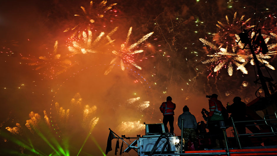 People watch as fireworks explode over the London Eye wheel during New Year celebrations in central London, Britain, January 1, 2020. PHOTO: REUTERS